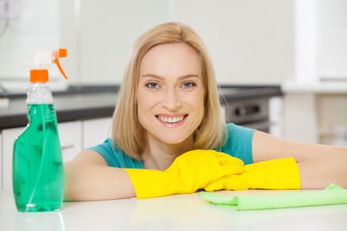 Technician using protective equipment during cleaning
