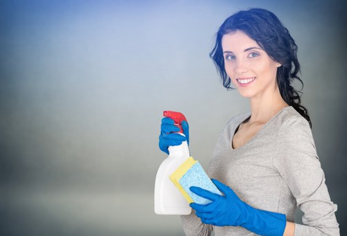 Bedroom tidy-up during domestic cleaning in Westkensington